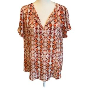 Daniel Rainn short-sleeve, vneck blouse. Size M. Beautiful cream/orange pattern.
